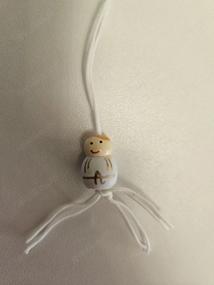 100x Glückspüppchen   Glücksbringer   mit Band