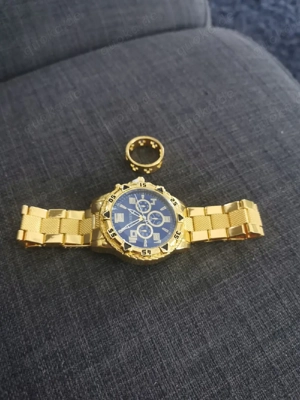 verkaufe meine goldene Uhr und ein goldener Ring