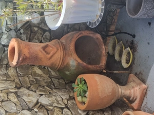 Terrakotta Ofen und blumentopf 