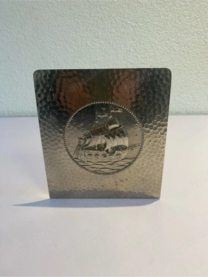 Buchstütze aus Metall mit Motiv