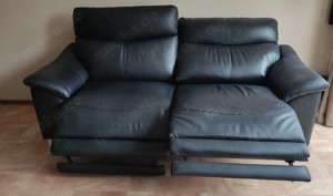 Couch mit ausfahrbarem Fußteil 