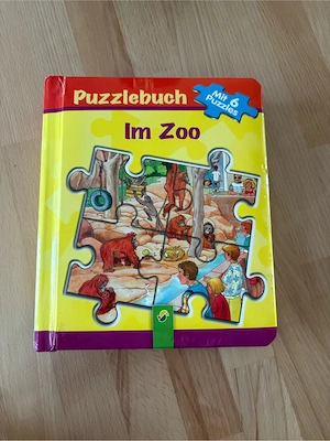 Neuwertiges Kinder Puzzle Buch  Im Zoo  von Schwager & Steinlein Verlag 