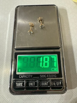 Luxuriöse Gold 585 Ohrstecker mit London Blue Topa