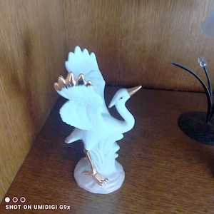 Bilder und Porzellanfiguren Bild 4