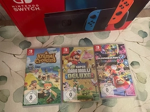 Nintendo switch 1 neon mit 3 spiele und originalverpakung