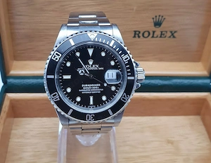ROLEX SUBMARINER 16610 DATE Stahl Box und Papiere FULL SET LC100 deutsche Uhr