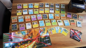 Pokemonkarten und Tinboxen und Buch + Bälle + Blöcke