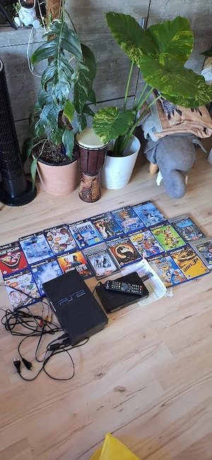 PS2 Konsole und 18 Spiele