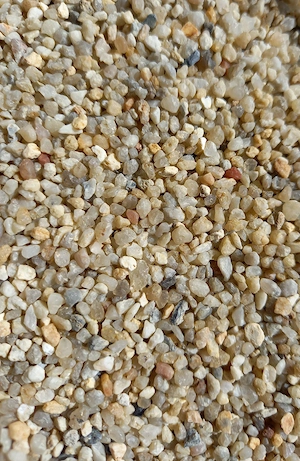 Aquariumkies  Naturbunt, gewalzt, nicht mehr scharfkantig