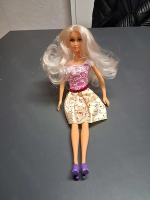 5 Barbie Puppen  Bild 1