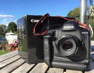 Canon EOS-1DX + 50mm 1.8 II MINT, 15K shutter actuations. boxed