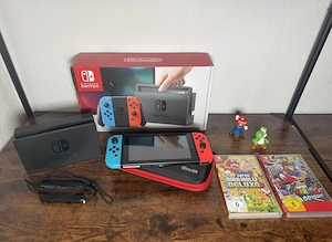 Nintendo Switch 1 neon und 2 spiele 