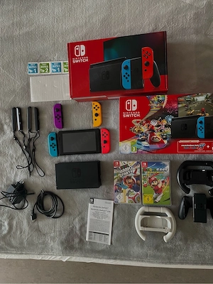 Nintendo Switch Komplettset + 4 Controller + 3 Spiele
