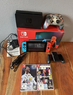 Nintendo Switch 1 neon mit 2 spiele plus verpakung 