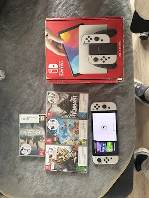 Nintendo Switch OLED modell spielkonsole mit verpakung + 4 spiele 