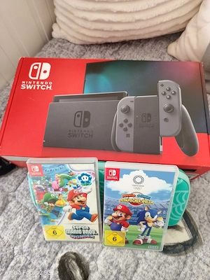 nintendo switch Konsole mit super Mario Bros wonder und Mario spiele mit verpakung 