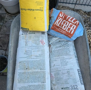 Suche Restmengen Baumaterial jeder Art Putz Gips Fliesenkleber Estrich Mörtel Fliesen Abholunghänger