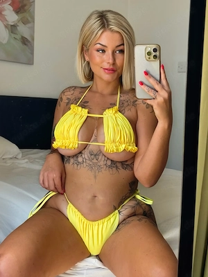 Heißer Telefonsex mit kurvigen Blondine Bild 3