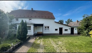 Hier wartet Potenzial. Einfamilienhaus mit Garten zu verkaufen.