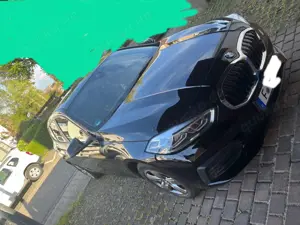 BMW 118 Advantage Bild 1