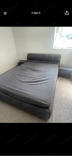 Bett mit Nachttischschrank