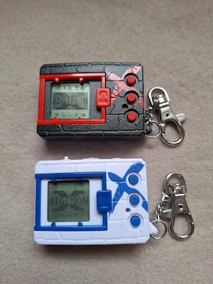 2 Digimon Tamagotchi rot blau