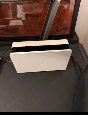 Nintendo Switch Oled mit Reisetasche und 3 Spielen