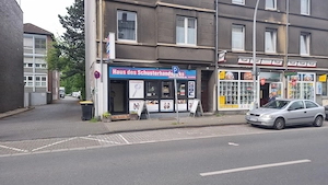 Schuh und schlüsseldienst mit lederwarengeschäft 