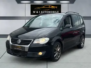 Volkswagen Touran 1.9TDI *1HAND*7SITZER*TEMPOMAT*XENON*AUX*KLIMA*