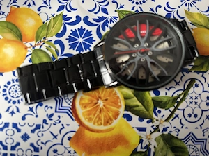 Armbanduhr Herren ,- zu verkaufen.(Zifferblatt Radfelge).