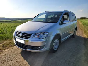 Volkswagen Touran Touran 1.9 TDI DPF Highline*BLS*7-Sitzer*Tempomat*Navi*PDC*Parkpilot*AHK