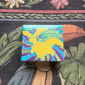 Pokémon TCG Erhabene Helden Top Trainer Box | NEU & OVP