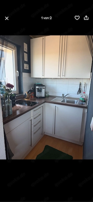 Einbauküche mit Einbaukühlschrank und Ceranfeld