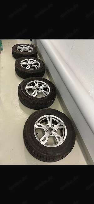 4 Winterreifen W671 215 70 R16 104H mit Alufelgen