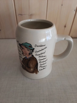 Bierkrug mit Schimpfnamen