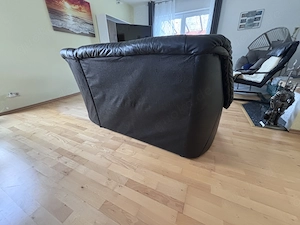 Schwarze Ledercouch günstig abzugeben 