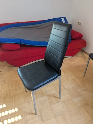 Stuhl schwarz Kunstleder 