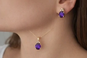 2er-Set in 750er-Gelbgold mit je einem Amethyst und Brillanten