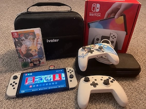 Nintendo Switch OLED Paket mit Spielen, Controllern & Zubehör