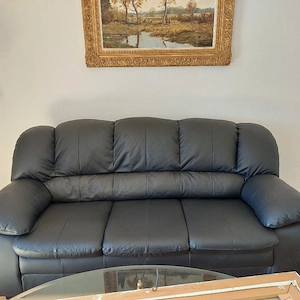 Ledercouch mit Hocker 