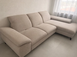 L-Couch mit Bettfunktion und Stauraum