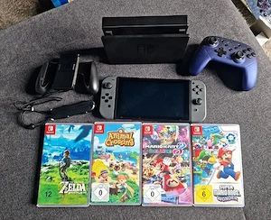 Nintendo Switch V2 spielkonsole + 4 spiel