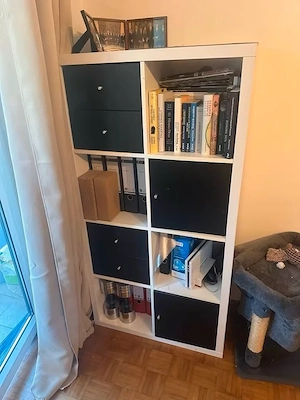 White KALLAX shelf 2x4 with black inserts
