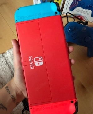 Nintendo Switch Oled mit zubehör und spiele  Bild 3