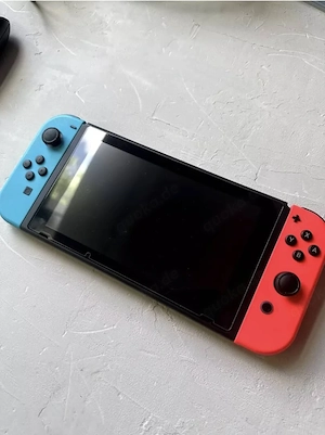 Neonrot blaue Nintendo Switch Joy-Con-Konsole mit Box, Spielen und Zubehör Bild 2