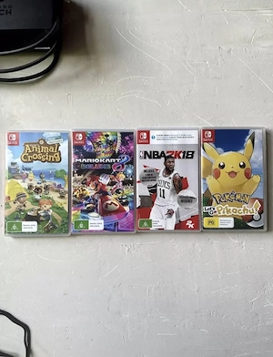 Neonrot blaue Nintendo Switch Joy-Con-Konsole mit Box, Spielen und Zubehör Bild 4