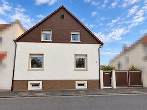 Einfamilienhaus mit Garten und Doppelgarage 