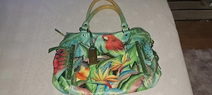 Anuschka-Handtasche aus echtem Leder mit einem farbenfrohen Vogel- und Blütendesign (Papagei und Par