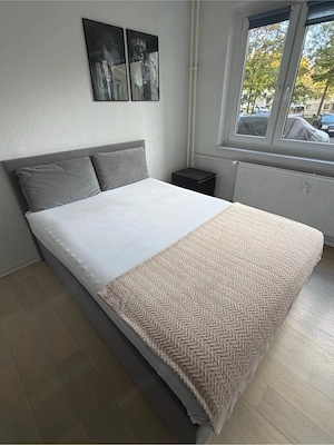Modernes Polsterbett 160   200 cm in Grau   neuwertig | inkl. Matratze & Kissen