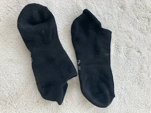 getragene Socken einer Sizilianerin